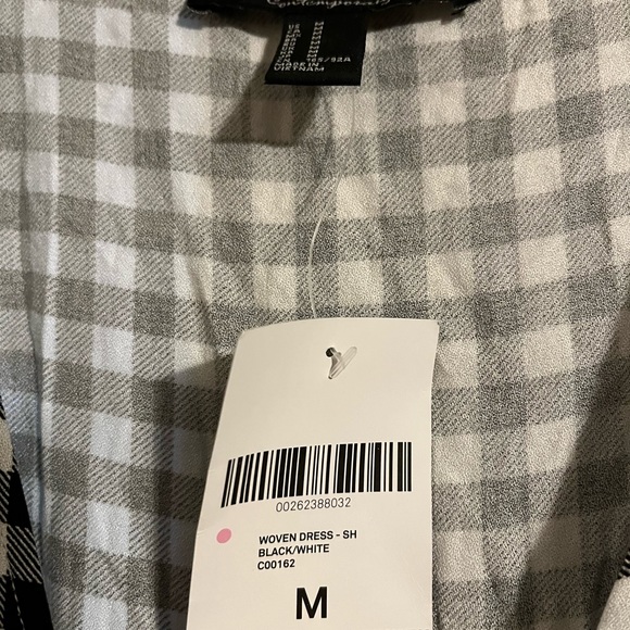 Forever 21 size medium black and white checkered wrap dress. - Picture 2 of 5